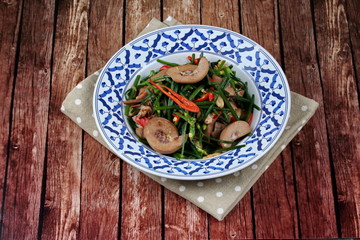 Spicy fried Chinese chives with chicken spleen.