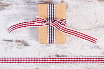 Gift wrapped in recycled paper and decorative ribbon, decoration for valentines day