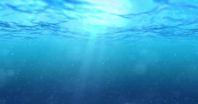 high quality perfectly seamless loop of deep blue ocean waves from underwater background with micro particles flowing, light rays shining through