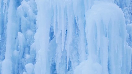 Icy waterfall close-up, blue ice mountain. - Powered by Adobe