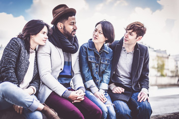 Multi-ethnic Group Of Friends Having Fun In Paris Along Seine