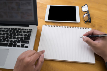 Empty Note Pad top , Notebook with copyspace on table with coffe