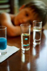 Dad with a child experimenting with vegetable oil