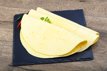 Tortilla on the wood background
