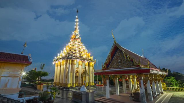 Wat Sangkat Rattana Khiri, ancient temple on the Sakae Krang him at night with beautiful lighting, Uthai Thani, Thailand.
