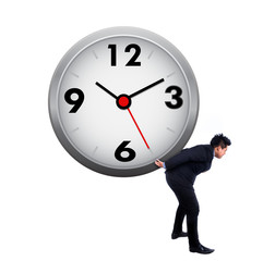Asian businessman carrying a clock on white