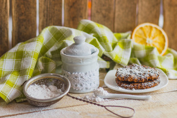 Cookies on the plate with sugar powder