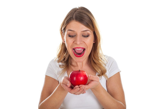 Beautiful woman holding an apple