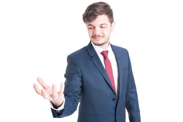 Business man standing and holding something