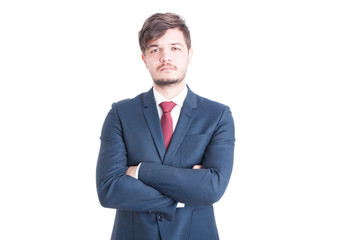 Business man looking sad posing with arms crossed
