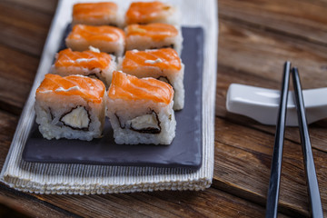 Delicious fresh rolls with salmon closeup