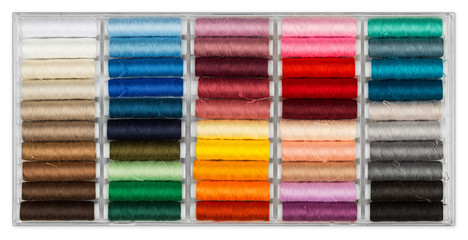 box with many colorful sewing cottons abstract color background