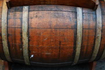 brown wooden wine barrel with metal rings