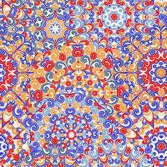 Seamless colorful ethnic pattern with mandalas in oriental style. Round doilies with red, blue, violet, brown curls and swirls weaving in arabesque traditional lace ornaments. Vector illustration.