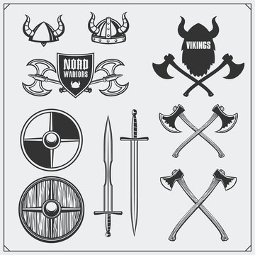 Viking set. Horned helmet, shield, sword and ax. Vintage style.