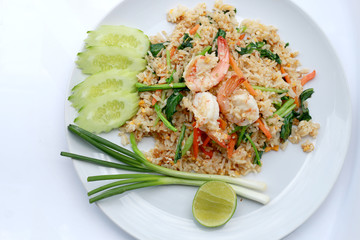 Delicious Shrimp fried rice. Unique style in the white dish on white background,  Thai food.