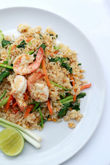Delicious Shrimp fried rice. Unique style in the white dish on white background,  Thai food.