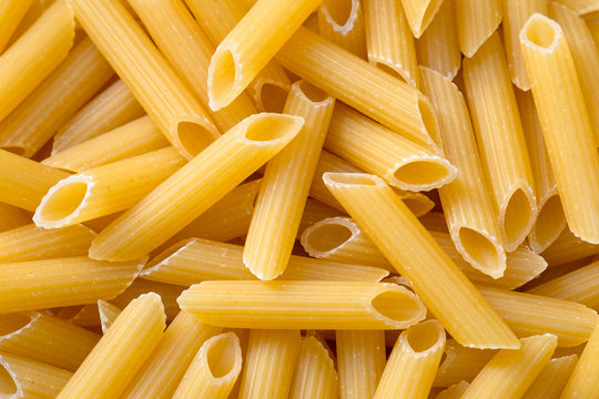 Penne pasta background.