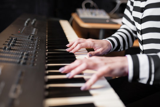 Hands music, synthesizer, piano