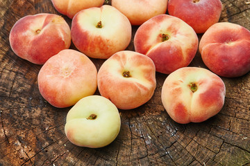 Peaches on old wooden