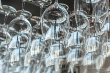 Hanging wineglasses in restaurant of New Zealand Sky tower.