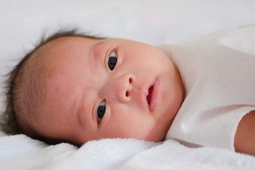 Cute baby 2 months, close-up portrait