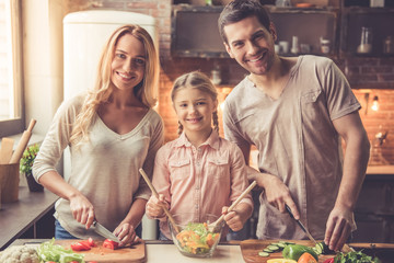 Young family cooking