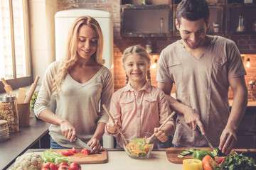 Young family cooking