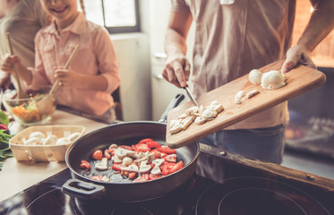 Young family cooking