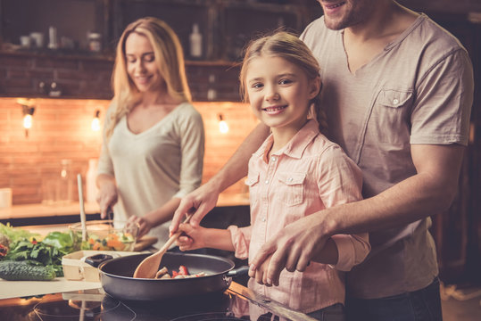 Young family cooking