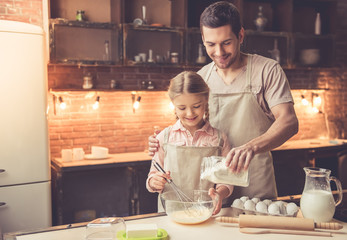 Father and daughter baking