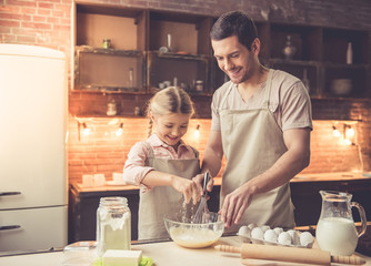 Father and daughter baking