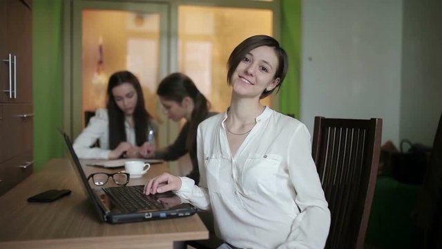 Girl finishes her work on laptop