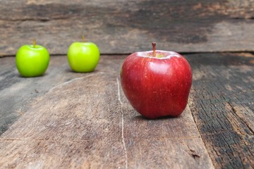 Red Apple Close up, on wooden background and copy space.
