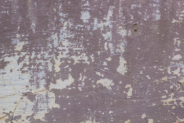 chipped paint on an old plaster wall