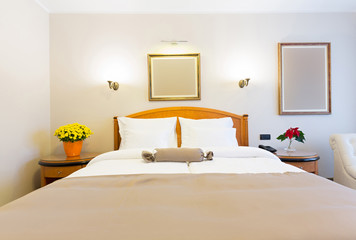 Interior of a new hotel double bed bedroom in the attic