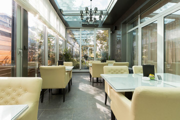Glazed restaurant terrace interior