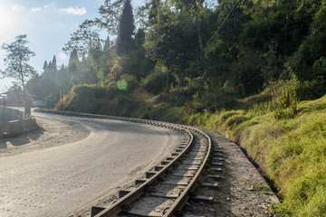 Fototapeta na wymiar The 2 ft narrow gauge line of Darjeeling Toy train, that runs between New Jalpaiguri and Darjeeling in the Indian state of West Bengal, India. 