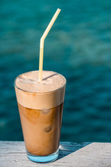 Morning coffee frappe by the sea.