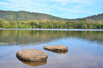 Fototapeta na wymiar two rock on the lake