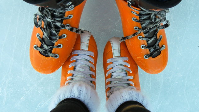 A pair of skates, standing on ice
