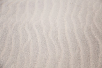 Fototapeta na wymiar Beautiful white sand at the sea beach