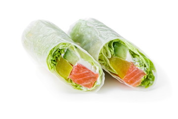Fresh appetising rolls with salmon  in a rice paper isolated 