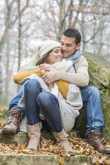 Fototapeta premium Young couple Walking Winter Woodland