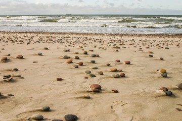 Fototapeta na wymiar Beautiful beach with a colorful pebbles in sand