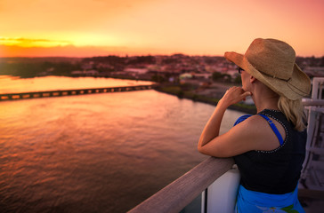 woman watching sunset on cruise
