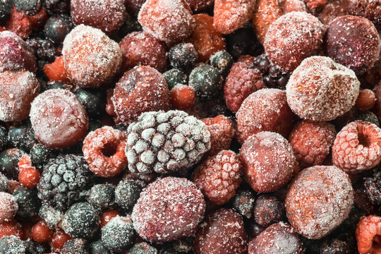 closeup of mixed frozen wild berries