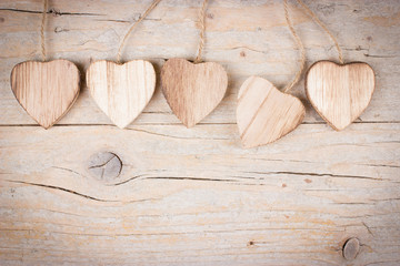 Five wooden hearts
