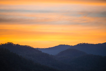 Mountaian view and orange sky in twilight time