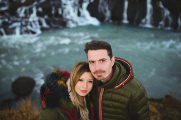 Couple at Fascinating Waterfall